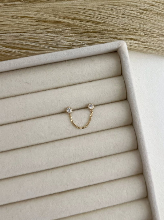 Broquel doble con cadena